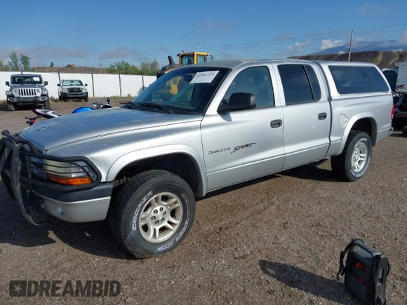 2001 Dodge Dakota Sport z VIN 1B7HG2AN91S290457, wystawiony jako IAAI lot #42381350 z przebiegiem 192 163 mil mil oraz . Historia ofert i sprzedaży dostępna na DreamBid. Obrazek 2.