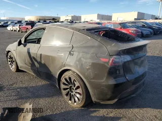 2023 Tesla Model Y Performance with VIN 7SAYGDEF5PF966796, listed as a Copart auction lot 88097325 with 6,927 mi miles and Salvage Title. Bid and sale history available at DreamBid. Image 2.