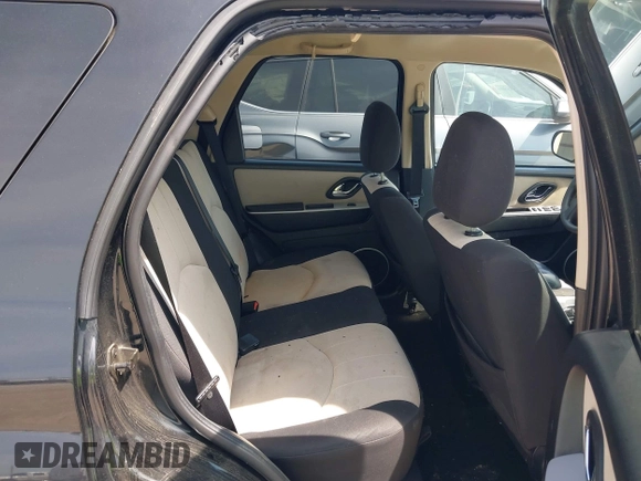2006 Mercury Mariner Convenience with VIN 4M2YU56Z66KJ04591, listed as a IAAI auction lot 42469116 with 174,952 mi miles and . Bid and sale history available at DreamBid. Image 8.