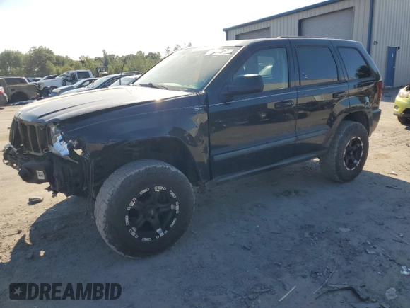 2008 Jeep Grand Cherokee Laredo with VIN 1J8GR48KX8C102393, listed as a Copart auction lot 69696834 with 173,049 mi miles and Salvage Title. Bid and sale history available at carsss.com. Image 1.