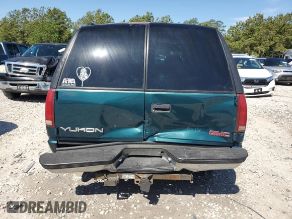 1999 GMC Yukon with VIN 1GKEC13R8XJ792078, listed as a Copart auction lot 50903294 with 232,672 mi miles and Salvage Title. Bid and sale history available at carsss.com. Image 6.