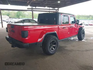 2021 Jeep Gladiator Willys z VIN 1C6HJTAG7ML602130, wystawiony jako IAAI lot #42161745 z przebiegiem 49 576 mil mil oraz . Historia ofert i sprzedaży dostępna na DreamBid. Obrazek 4.