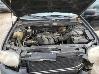 2002 Ford Escape XLS Choice with VIN 1FMYU02102KB67376, listed as a Copart auction lot 79109394 with 234,306 mi miles and Salvage title. Bid and sale history available at DreamBid. Image 12.