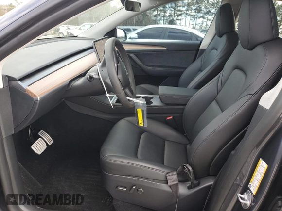 2023 Tesla Model Y Performance with VIN 7SAYGDEF4PF920859, listed as a Copart auction lot 89136705 with 8,148 mi miles and Salvage Title. Bid and sale history available at DreamBid. Image 7.