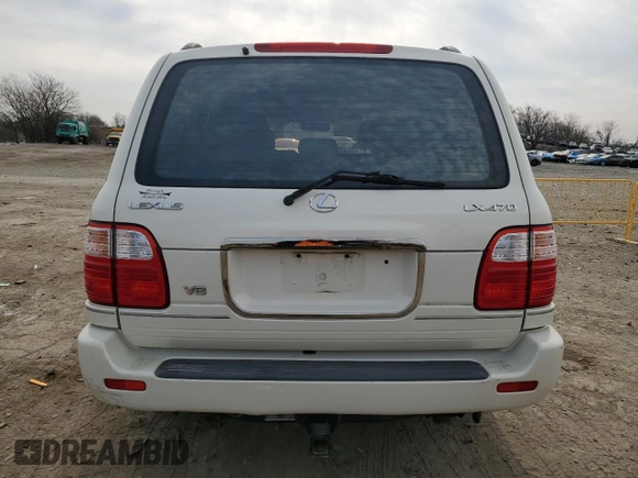 2000 Lexus LX 470 z VIN JT6HT00W8Y0126253, wystawiony jako Copart lot #49400665 z przebiegiem 181 328 mil mil oraz Szkody całkowita. Historia ofert i sprzedaży dostępna na DreamBid. Obrazek 6.
