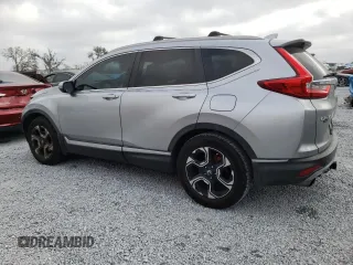 2018 Honda CR-V Touring with VIN 7FARW1H93JE055337, listed as a Copart auction lot 45045305 with 74,776 mi miles and Salvage Title. Bid and sale history available at DreamBid. Image 2.
