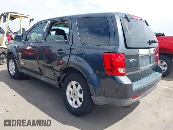 2008 Mazda Tribute ES with VIN 4F2CZ06188KM01024, listed as a IAAI auction lot 41890148 with 122,367 mi miles. Bid and sale history available at carsss.com. Image 3.
