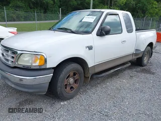 2003 Ford F-150 XL with VIN 1FTRX07WX3KD86058, listed as a IAAI auction lot 42502946 with Not provided miles and . Bid and sale history available at DreamBid. Image 2.