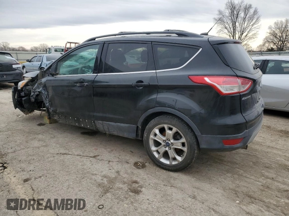 2013 Ford Escape SE with VIN 1FMCU0GXXDUB76102, listed as a Copart auction lot 44226025 with 104,127 mi miles and Salvage Title. Bid and sale history available at DreamBid. Image 2.