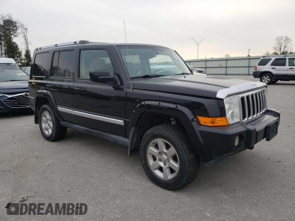 2007 Jeep Commander Overland with VIN 1J8HG68247C557731, listed as a Copart auction lot 87964795 with 174,195 mi miles and Salvage title. Bid and sale history available at DreamBid. Image 4.