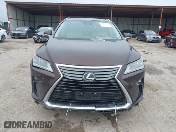 2016 Lexus RX 350 z VIN 2T2ZZMCA5GC029529, wystawiony jako IAAI lot #41953567 z przebiegiem 133 460 mil mil oraz . Historia ofert i sprzedaży dostępna na DreamBid. Obrazek 12.