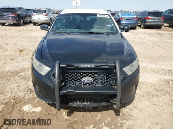 2014 Ford Police Interceptor with VIN 1FAHP2L81EG148870, listed as a Copart auction lot 73039214 with 255,800 mi miles and Salvage title. Bid and sale history available at DreamBid. Image 5.