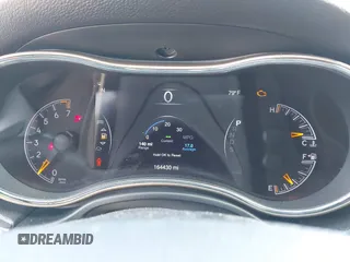 2014 Jeep Grand Cherokee Laredo with VIN 1C4RJFAG1EC315544, listed as a IAAI auction lot 42105987 with 164,430 mi miles. Bid and sale history available at carsss.com. Image 7.
