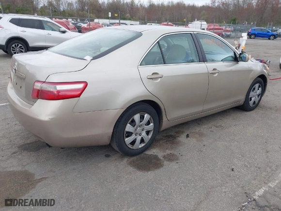 2007 Toyota Camry CE with VIN 4T1BE46K07U700447, listed as a IAAI auction lot 42085195 with 254,770 mi miles. Bid and sale history available at carsss.com. Image 4.