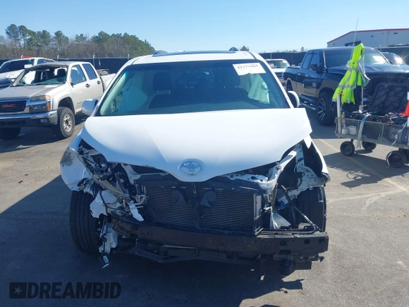 2015 Toyota Sienna SE with VIN 5TDXK3DC4FS566084, listed as a IAAI auction lot 41777561 with 153,002 mi miles and . Bid and sale history available at carsss.com. Image 13.