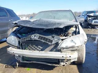 2005 Honda Civic VP z VIN 1HGEM21115L008208, wystawiony jako IAAI lot #41650783 z przebiegiem 133 613 mil mil oraz . Historia ofert i sprzedaży dostępna na DreamBid. Obrazek 13.
