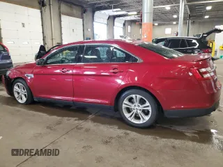 2016 Ford Taurus SEL with VIN 1FAHP2E81GG125802, listed as a Copart auction lot 62491045 with 99,704 mi miles and Salvage title. Bid and sale history available at DreamBid. Image 2.