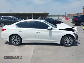 2014 Infiniti Q50 Premium z VIN JN1BV7AP8EM691683, wystawiony jako IAAI lot #42064258 z przebiegiem 146 805 mil mil oraz . Historia ofert i sprzedaży dostępna na DreamBid. Obrazek 14.