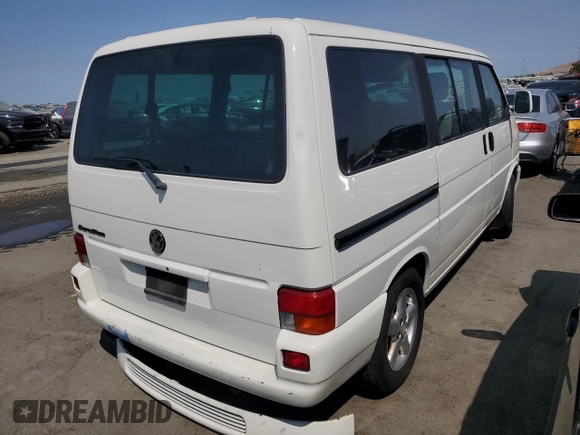 2003 Volkswagen EuroVan MV с VIN WV2MB47033H038192, выставлен на аукционе Copart как лот 67783954 с пробегом 176 595 миль миль и Списание • Salvage title. История ставок и продаж доступна на DreamBid. Изображение 3.