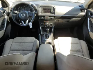 2014 Mazda CX-5 Touring with VIN JM3KE4CY4E0407868, listed as a Copart auction lot 52564315 with 137,989 mi miles and Salvage Title. Bid and sale history available at carsss.com. Image 8.