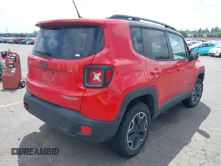2015 Jeep Renegade Trailhawk with VIN ZACCJBCT7FPB80933, listed as a IAAI auction lot 42461878 with 138,803 mi miles and . Bid and sale history available at DreamBid. Image 4.