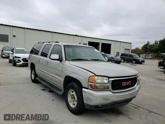 2005 GMC Yukon XL SLE with VIN 1GKEC16Z25J174781, listed as a Copart auction lot 77682034 with 223,441 mi miles and Clean Title. Bid and sale history available at DreamBid. Image 12.