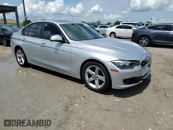 2013 BMW 3 Series 328i with VIN WBA3C1G52DNR49440, listed as a Copart auction lot 61546685 with 118,308 mi miles and Salvage title. Bid and sale history available at DreamBid. Image 13.