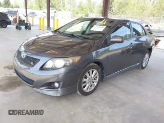 2009 Toyota Corolla with VIN 1NXBU40E79Z133873, listed as a IAAI auction lot 42132035 with 232,578 mi miles. Bid and sale history available at carsss.com. Image 2.