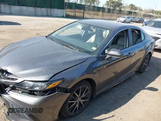 2023 Toyota Camry SE z VIN 4T1G11BK6PU096991, wystawiony jako IAAI lot #42062219 z przebiegiem 82 824 mil mil oraz . Historia ofert i sprzedaży dostępna na DreamBid. Obrazek 14.