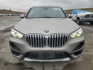 2021 BMW X1 xDrive28i z VIN WBXJG9C03M5U47126, wystawiony jako Copart lot #52113955 z przebiegiem 69 284 mil mil oraz Szkody całkowita. Historia ofert i sprzedaży dostępna na DreamBid. Obrazek 5.