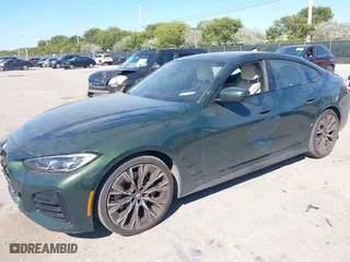 2022 BMW 4 Series 430i with VIN WBA63AV02NFM97103, listed as a IAAI auction lot 41756950 with 31,451 mi miles. Bid and sale history available at carsss.com. Image 2.