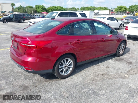 2017 Ford Focus SE with VIN 1FADP3F20HL322676, listed as a IAAI auction lot 42391149 with 115,370 mi miles and . Bid and sale history available at DreamBid. Image 4.