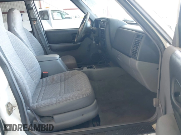 1997 Jeep Cherokee Sport with VIN 1J4FJ68S4VL584953, listed as a IAAI auction lot 42696694 with 135,545 mi miles and . Bid and sale history available at DreamBid. Image 5.