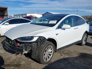 2018 Tesla Model X 75D with VIN 5YJXCDE28JF115455, listed as a IAAI auction lot 41878021 with 87,626 mi miles. Bid and sale history available at carsss.com. Image 25.