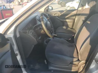 2000 Ford Focus LX with VIN 1FAFP33P6YW376765, listed as a Copart auction lot 75347554 with 189,468 mi miles and Salvage Title. Bid and sale history available at DreamBid. Image 7.