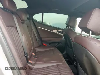 2022 Genesis G70 2.0T z VIN KMTG34TA3NU091204, wystawiony jako Copart lot #57073325 z przebiegiem 62 529 mil mil oraz Szkoda całkowita • Salvage title. Historia ofert i sprzedaży dostępna na DreamBid. Obrazek 10.