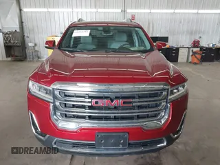2023 GMC Acadia SLT with VIN 1GKKNULS2PZ220880, listed as a IAAI auction lot 42104702 with 33,536 mi miles and . Bid and sale history available at DreamBid. Image 13.