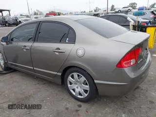 2006 Honda Civic LX with VIN 2HGFA16586H507296, listed as a IAAI auction lot 42101001 with 144,781 mi miles and . Bid and sale history available at DreamBid. Image 3.
