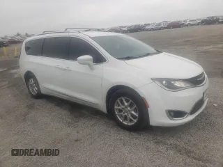 2020 Chrysler Pacifica Touring L with VIN 2C4RC1BG5LR131028, listed as a Copart auction lot 56505555 with 102,972 mi miles and Salvage title. Bid and sale history available at DreamBid. Image 4.