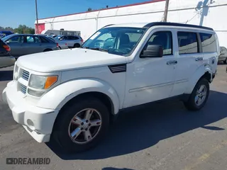2010 Dodge Nitro SXT with VIN 1D4PU5GK3AW115958, listed as a IAAI auction lot 40357456 with 162,548 mi miles. Bid and sale history available at carsss.com. Image 19.