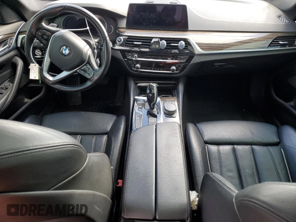 2018 BMW 5 Series 530e with VIN WBAJA9C52JG623073, listed as a Copart auction lot 82718984 with 79,543 mi miles and Clean title. Bid and sale history available at DreamBid. Image 8.