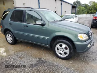 2002 Mercedes-Benz M-Class with VIN 4JGAB54EX2A313793, listed as a Copart auction lot 72600614 with 140,053 mi miles and Salvage Title. Bid and sale history available at carsss.com. Image 4.