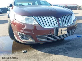 2009 Lincoln MKS with VIN 1LNHM94R89G633866, listed as a IAAI auction lot 41794698 with 136,269 mi miles. Bid and sale history available at carsss.com. Image 6.