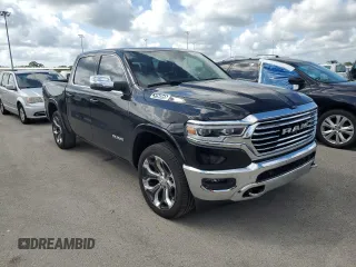 2023 Ram 1500 Longhorn with VIN 1C6SRFKT6PN505392, listed as a Copart auction lot 75026734 with 14,774 mi miles and Salvage title. Bid and sale history available at DreamBid. Image 4.
