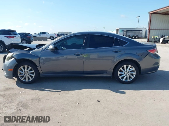 2011 Mazda 6 i Grand Touring with VIN 1YVHZ8CHXB5M27937, listed as a IAAI auction lot 42574587 with 203,952 mi miles and . Bid and sale history available at DreamBid. Image 14.