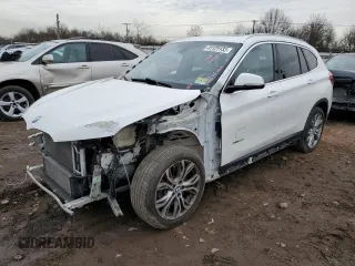 2016 BMW X1 xDrive28i with VIN WBXHT3C36GP884211, listed as a Copart auction lot 41121133 with 62,282 mi miles. Bid and sale history available at carsss.com. Image 1.