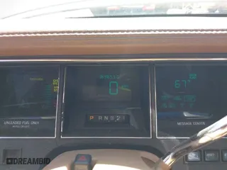 1994 Lincoln Town Car Signature with VIN 1LNLM82W5RY616904, listed as a IAAI auction lot 41811628 with 163,653 mi miles. Bid and sale history available at carsss.com. Image 7.
