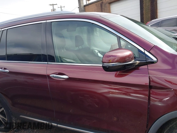 2020 Honda Pilot Touring 8-Passenger with VIN 5FNYF5H94LB012062, listed as a IAAI auction lot 40806740 with 115,431 mi miles and . Bid and sale history available at DreamBid. Image 13.