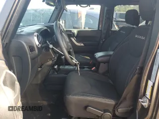 2016 Jeep Wrangler Unlimited Sahara с VIN 1C4BJWEG5GL221827, выставлен на аукционе Copart как лот 60411625 с пробегом 65 405 миль миль и Списание • Salvage title. История ставок и продаж доступна на DreamBid. Изображение 7.