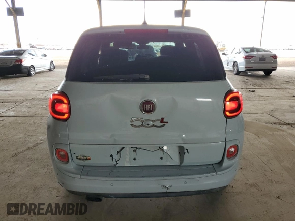 2014 FIAT 500L Easy с VIN ZFBCFABH6EZ024863, выставлен на аукционе Copart как лот 65282035 с пробегом 99 407 миль миль и Чистый • Clean title. История ставок и продаж доступна на DreamBid. Изображение 6.